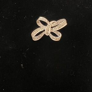 Elegant Silver Bow Brooch